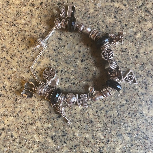 Fully loaded AUTHENTIC pandora bracelet.
